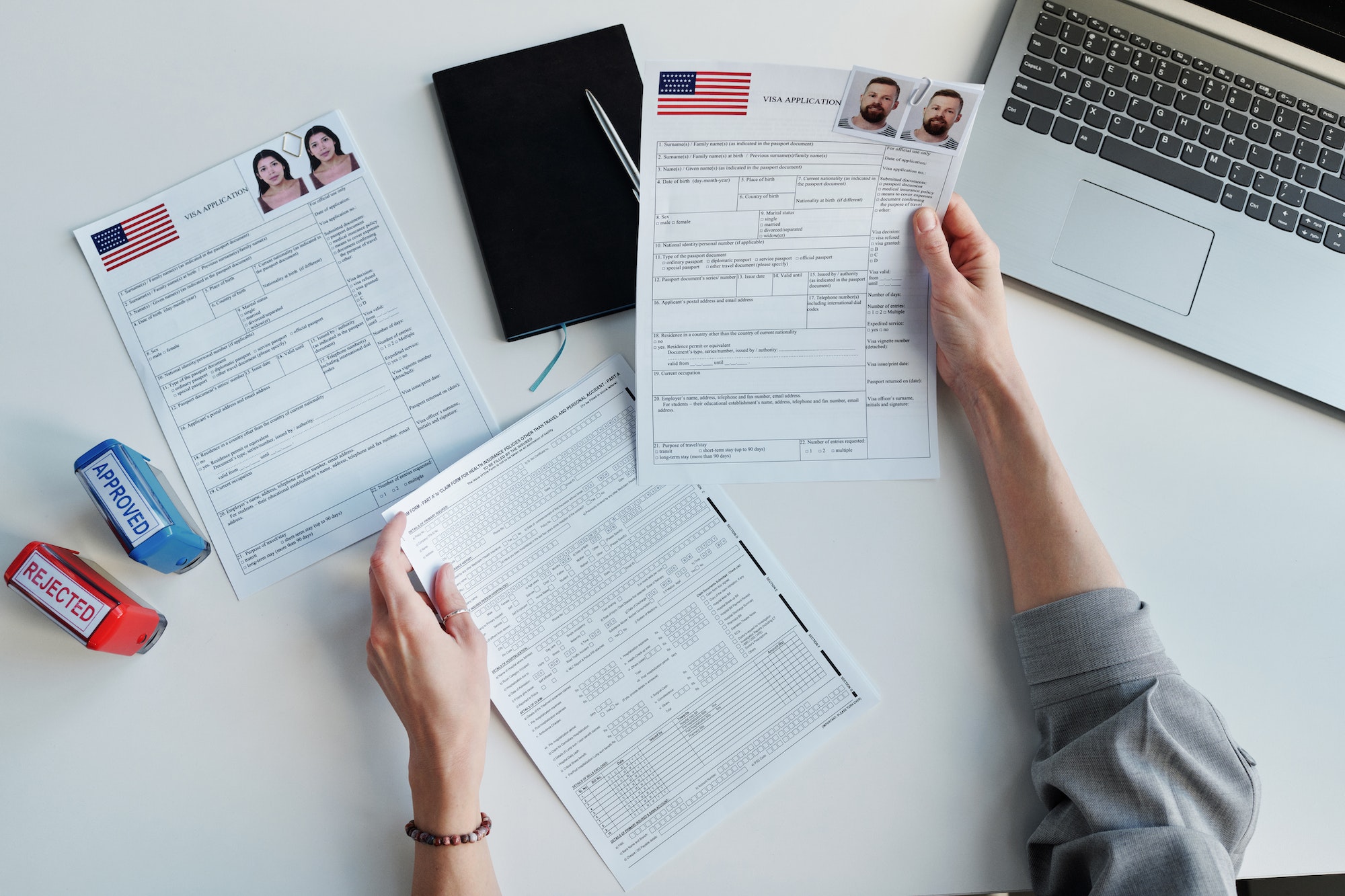 Checking Visa Application Papers At Office-letsworkabroad